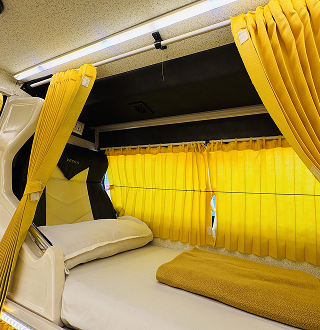 Varahi Tours and Travels coach 8